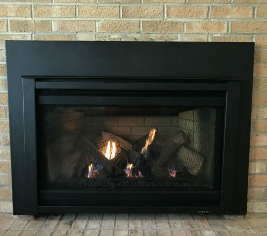 Traditions Chimney Sweeps stock photo of nice black insert. We have chimney and fireplace of products this is a nice black insert.