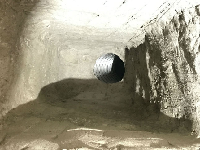 Interior view of a parged smooth smoke chamber.