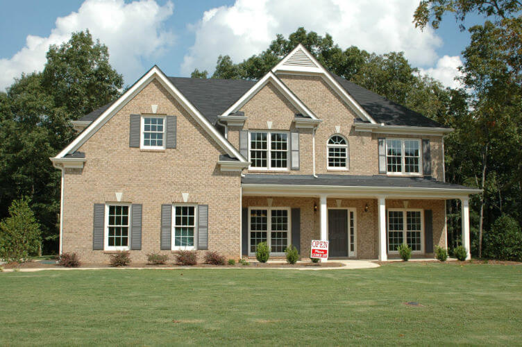 We also do real estate inspections.  Beautiful two story home with nice shrubbery.